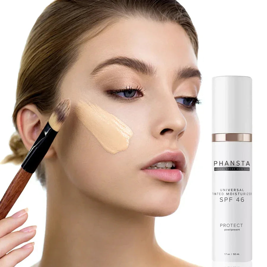 Woman applying PHANSTA universal tinted moisturizer SPF 46 with makeup brush to face