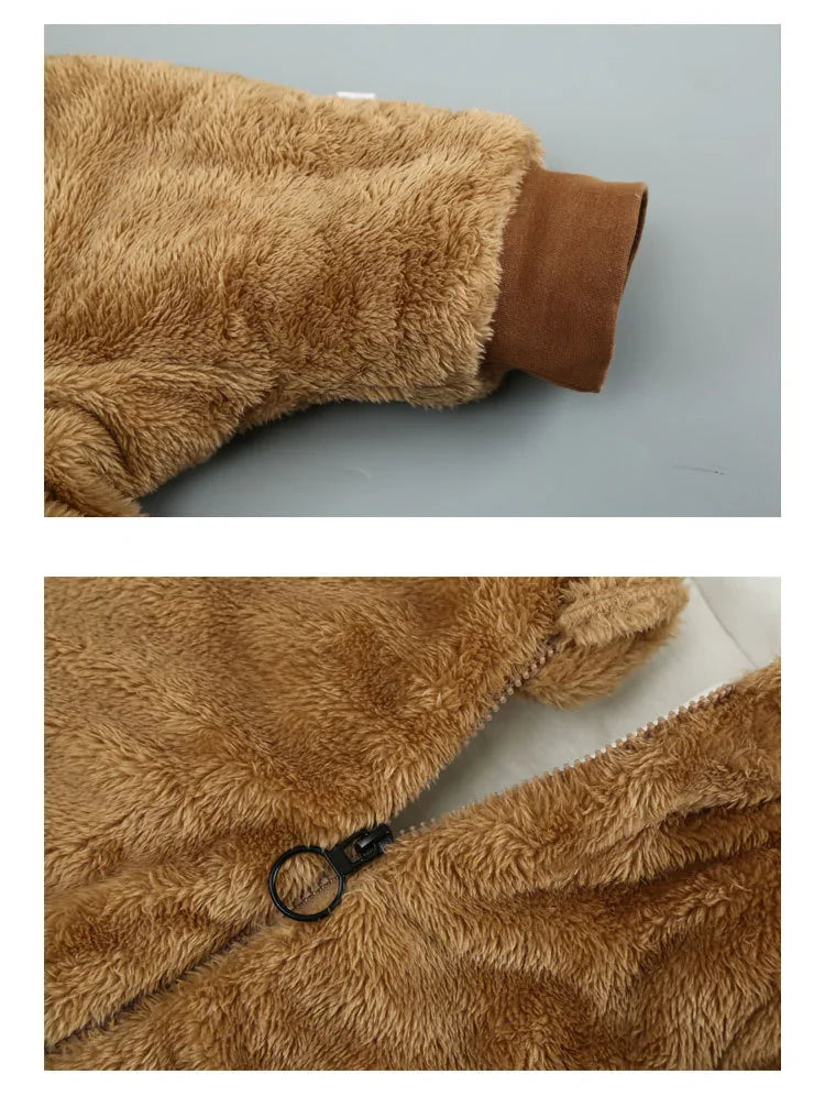 Brown faux fur jacket with ribbed cuffs and black zipper detail